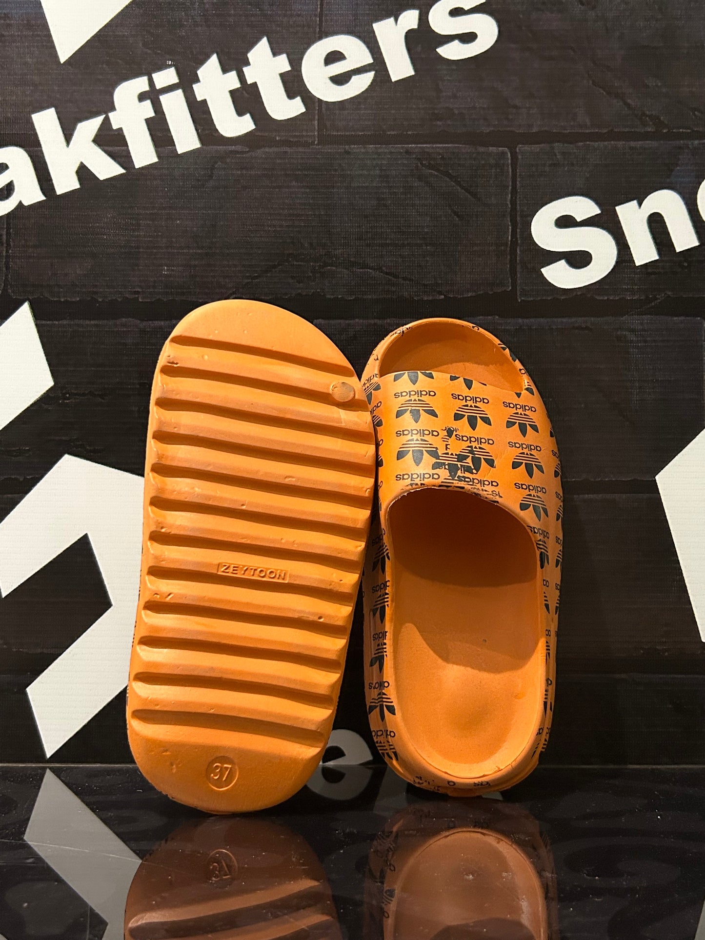 NKE - D5 - Slides - Orange